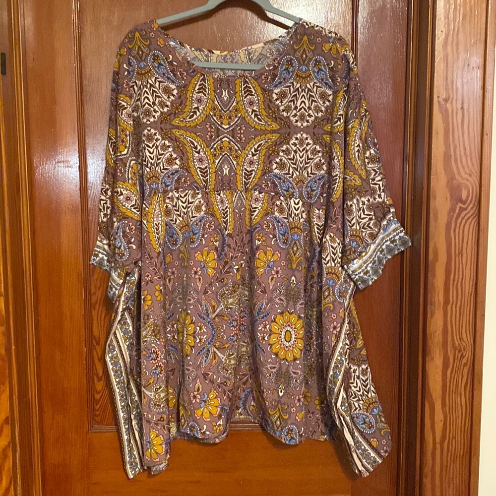 This is a womens 2XL top from Shein. Is quite large more like 4X. New in package